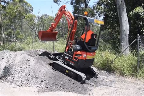 mini excavator on hillside|mini digger steep slope.